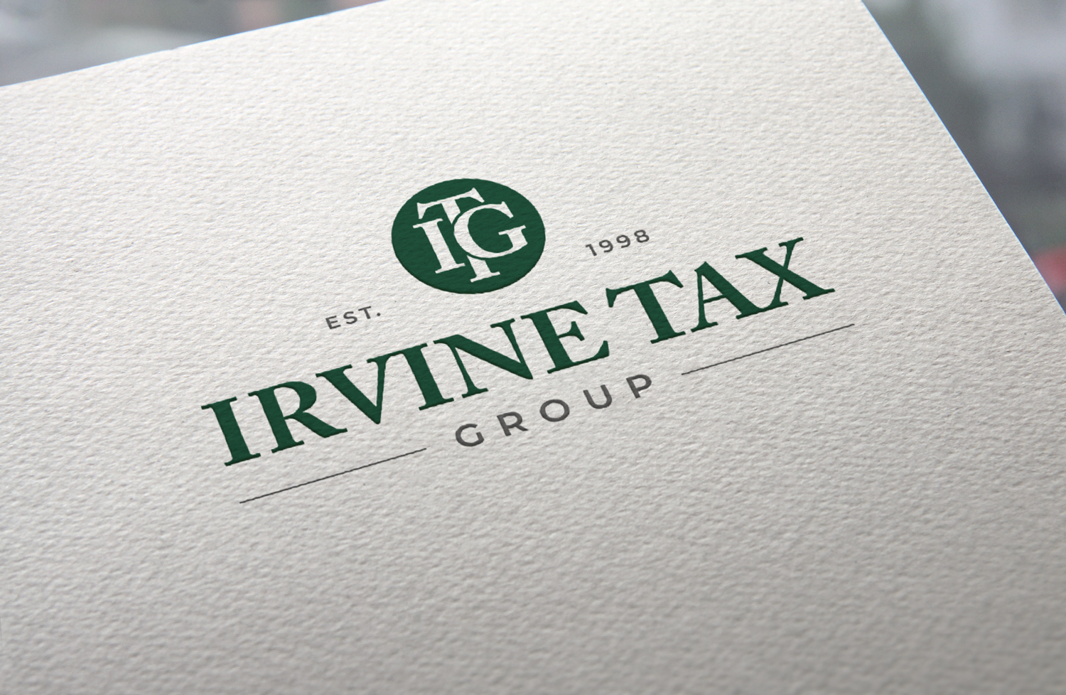 Irvine Tax Group embossed logo